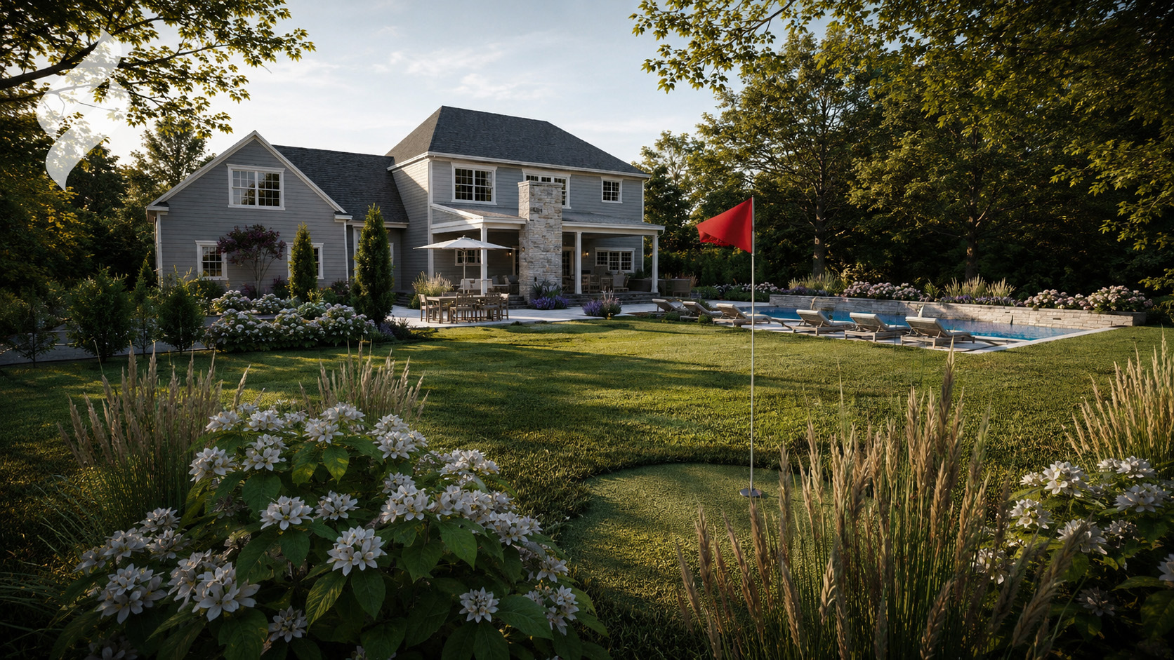 Backyard with putting green, pool, and ornamental grasses
