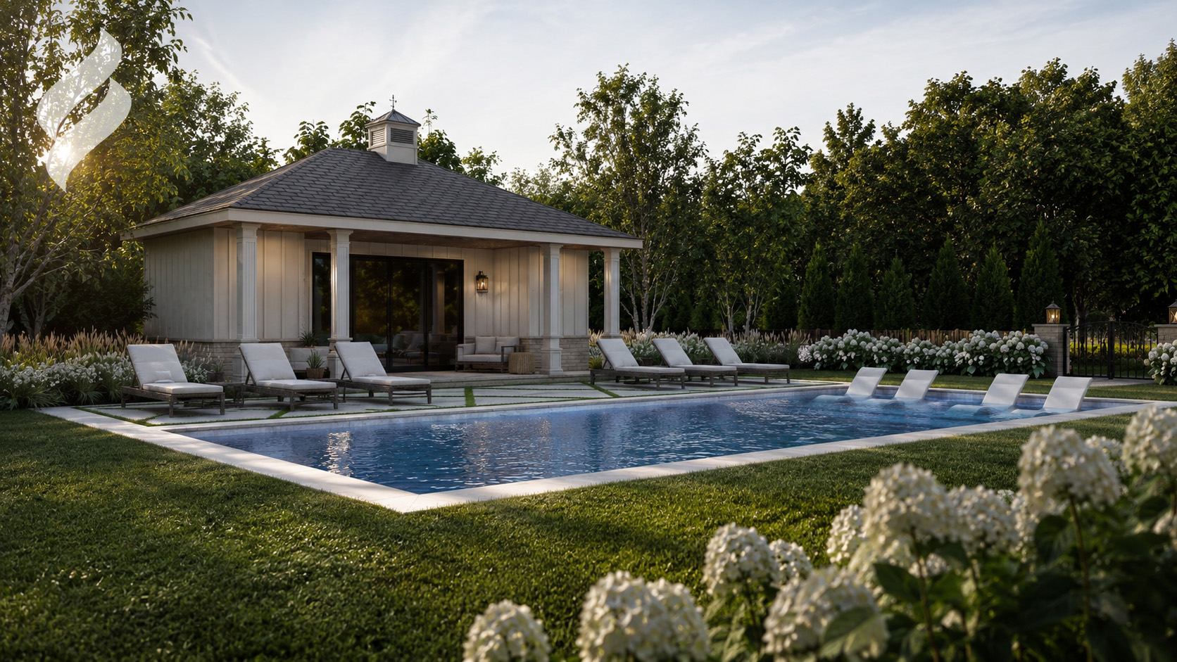 Pool house and rectangular pool framed by hydrangeas